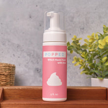 Load image into Gallery viewer, Bottle of Popped Witch Hazel Foam with marble background