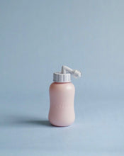 Load image into Gallery viewer, Alternate view of the Popped Peri Bottle for postpartum recovery with nozzle retracted (on a blue background).
